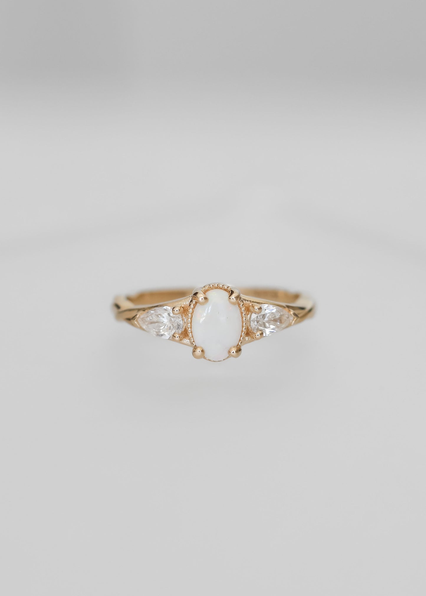 opal engagement ring, Shea setting ring, 14K yellow gold opal ring, minimalist engagement ring, pear diamond accents, vintage-inspired bridal ring, unique gemstone ring, custom opal ring