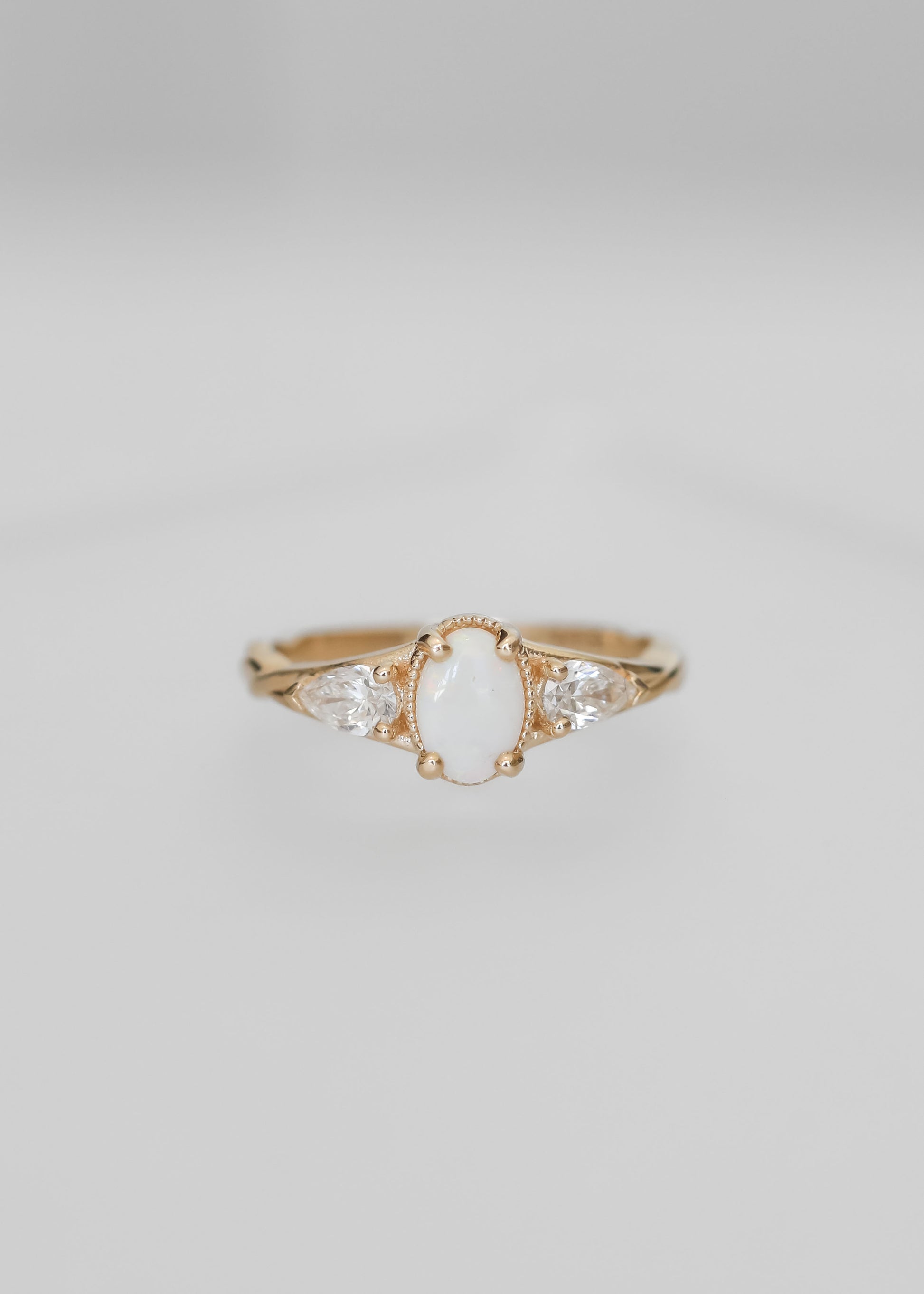 opal engagement ring, Shea setting ring, 14K yellow gold opal ring, minimalist engagement ring, pear diamond accents, vintage-inspired bridal ring, unique gemstone ring, custom opal ring