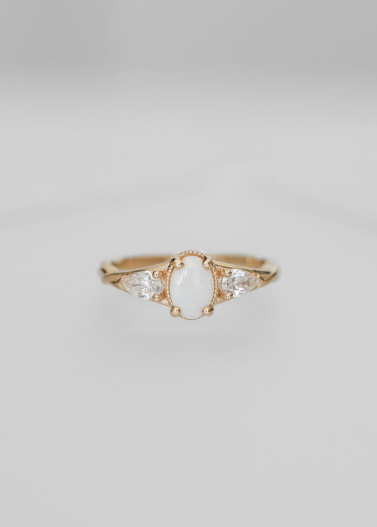 opal engagement ring, Shea setting ring, 14K yellow gold opal ring, minimalist engagement ring, pear diamond accents, vintage-inspired bridal ring, unique gemstone ring, custom opal ring