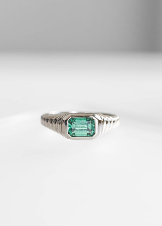 SEO Keywords: teal moissanite engagement ring, emerald cut moissanite ring, ribbed band engagement ring, 14k white gold moissanite ring, bezel set moissanite ring, modern engagement ring, gender neutral engagement ring, alternative bridal ring
