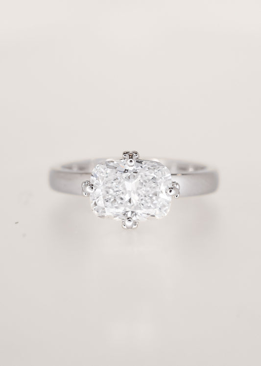 Lavender sprig prong east west elongated cushion lab grown diamond lesbian engagement ring in 14K white gold, pairs with the Greta