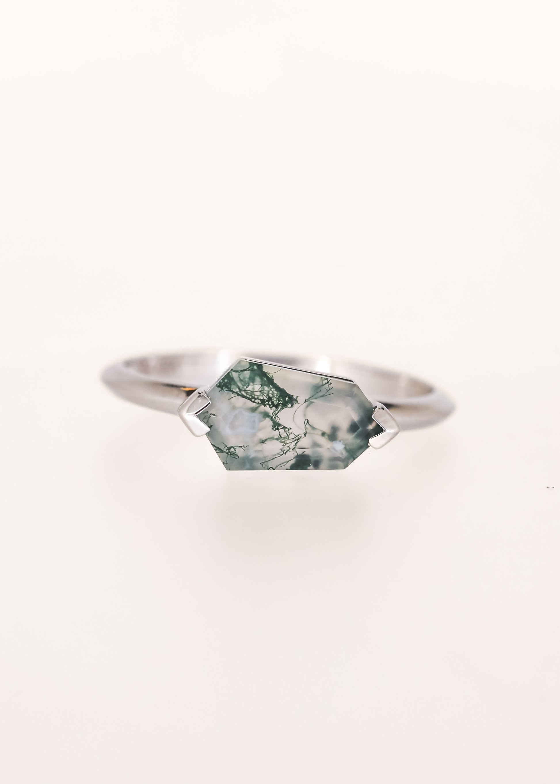 Minimal east west kite cut moss agate engagement ring in 14K white gold with half bezel setting