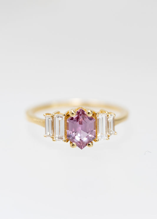 Art Deco hexagon cut pink sapphire engagement ring in 14K yellow gold with graduated baguette side stones
