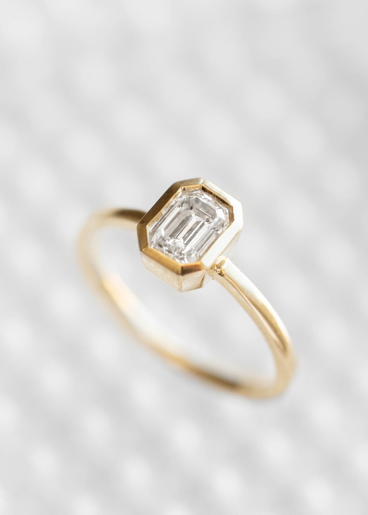 The Leda | .64ct Emerald Cut Diamond | Yellow Gold