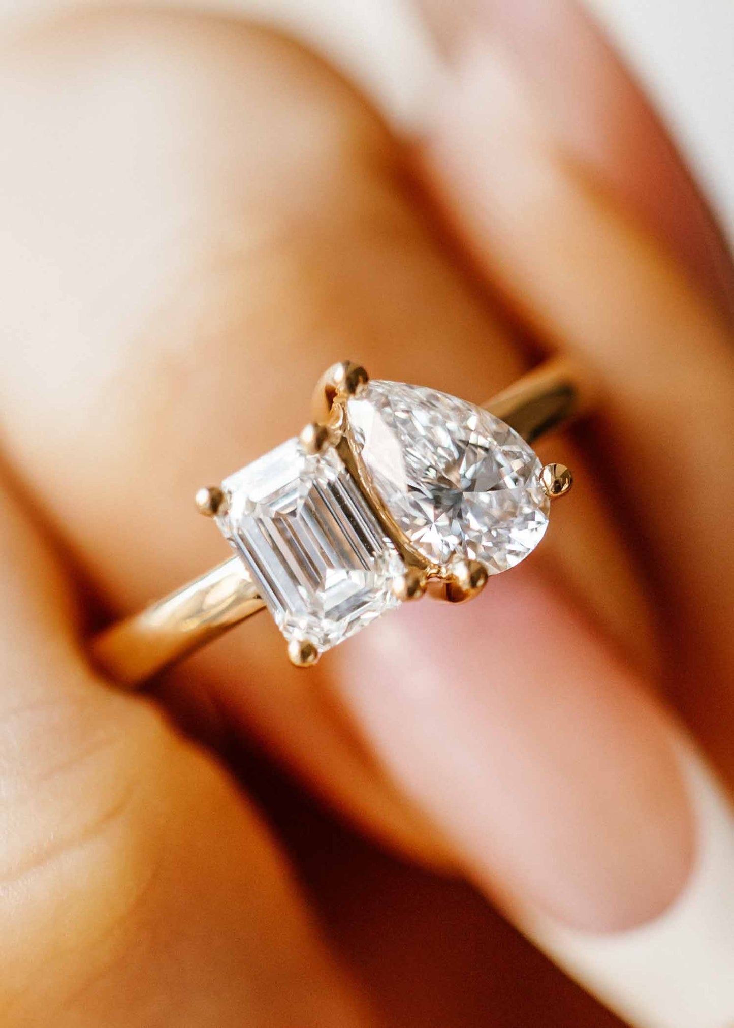 The Vela Ring | 1.03ct Lab-Grown Emerald Cut + 1.02ct Lab-Grown Pear | Yellow Gold