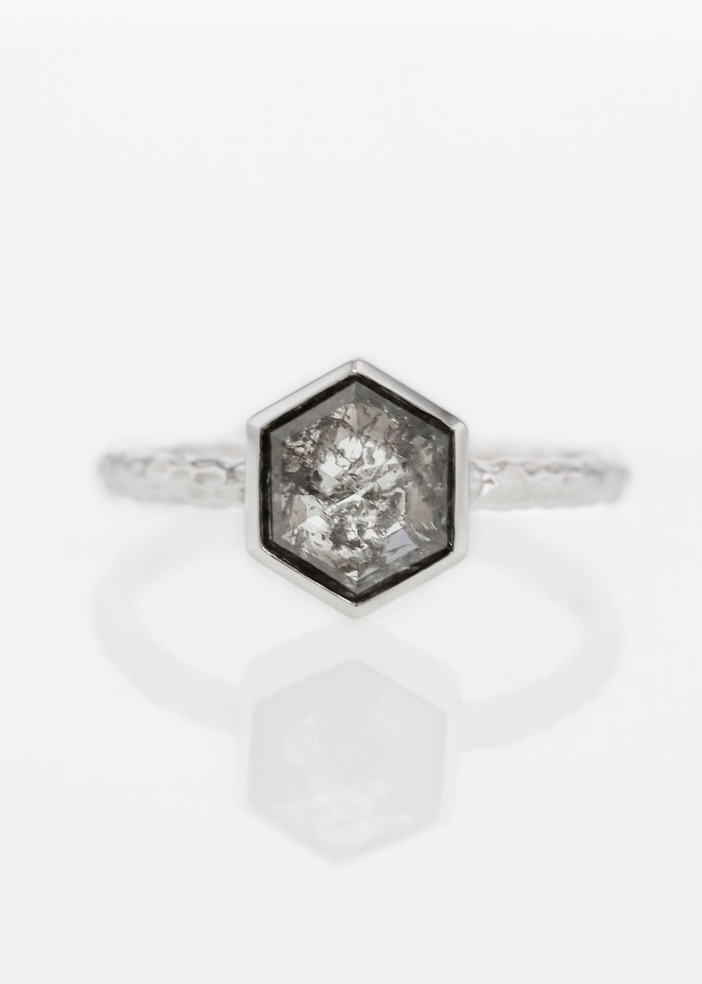 salt and pepper diamond engagement ring, bezel set engagement ring, modern hexagon diamond ring, The Leda setting, white gold hammered band ring, non-traditional engagement ring, sculptural bridal jewelry, ethical diamond ring
