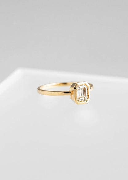 The Leda | .64ct Emerald Cut Diamond | Yellow Gold