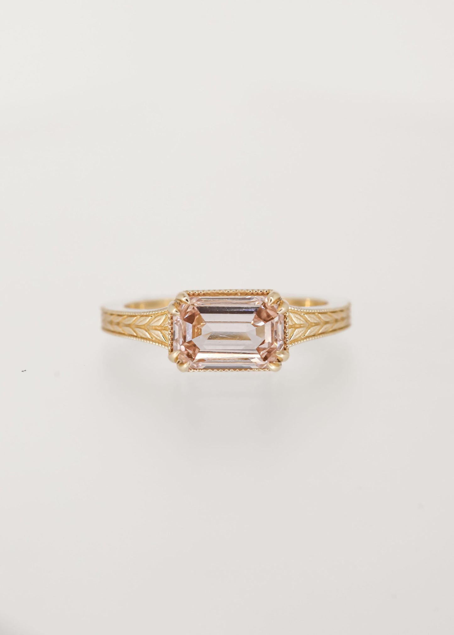 Vintage engraved east west emerald cut champagne diamond engagement ring in 14K yellow gold with milgrain and wheat detailing