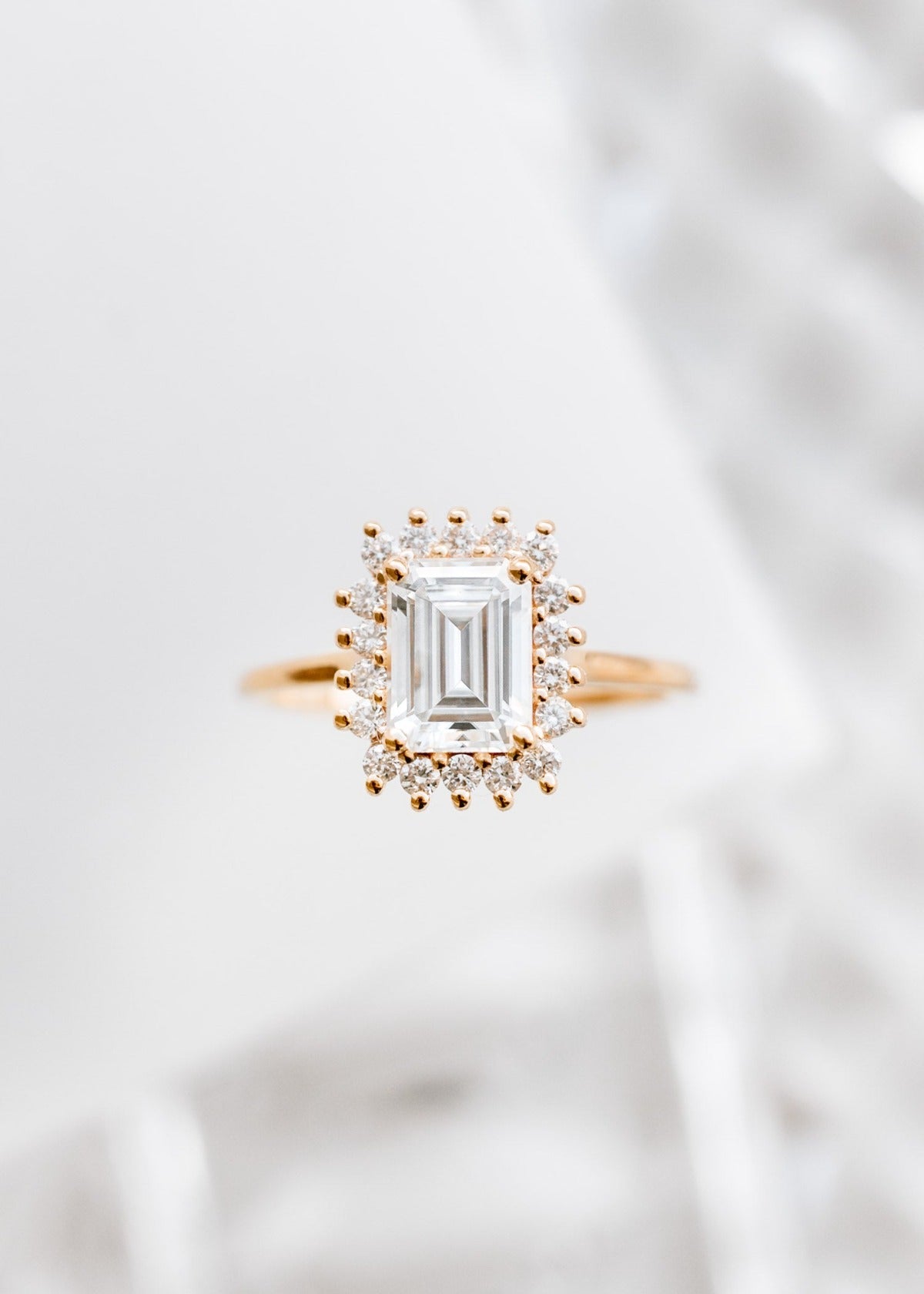 Emerald cut moissanite engagement ring